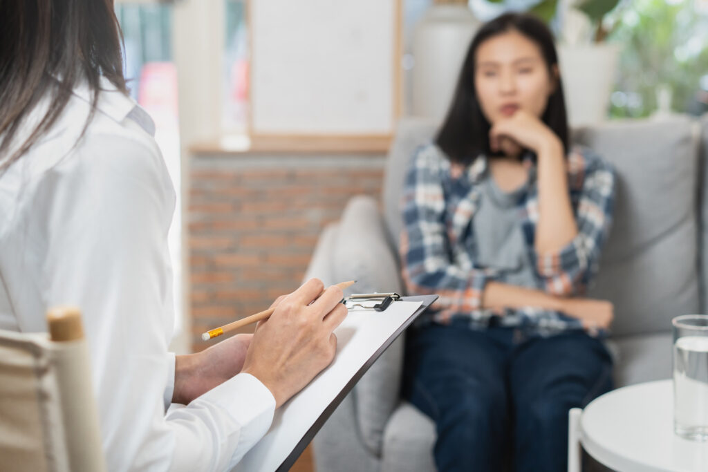 Cognitive Behavioral Therapy session with therapist and client
