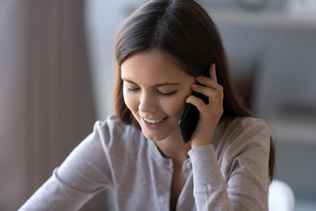 New client having an initial therapy phone consultation